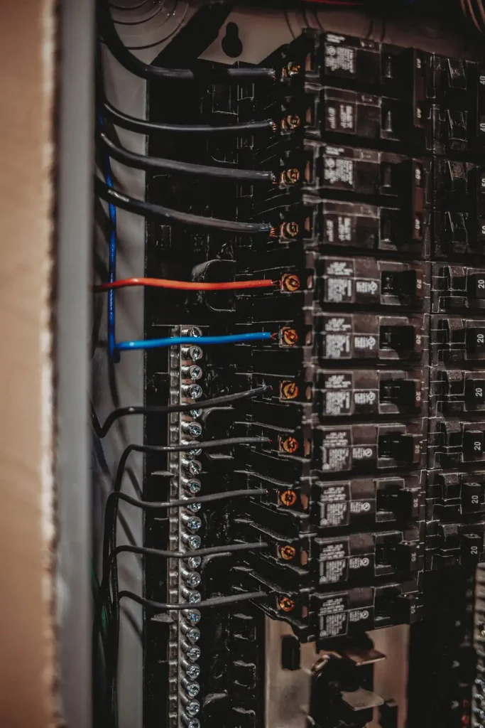 Close-up of electrical circuit breakers and wires.