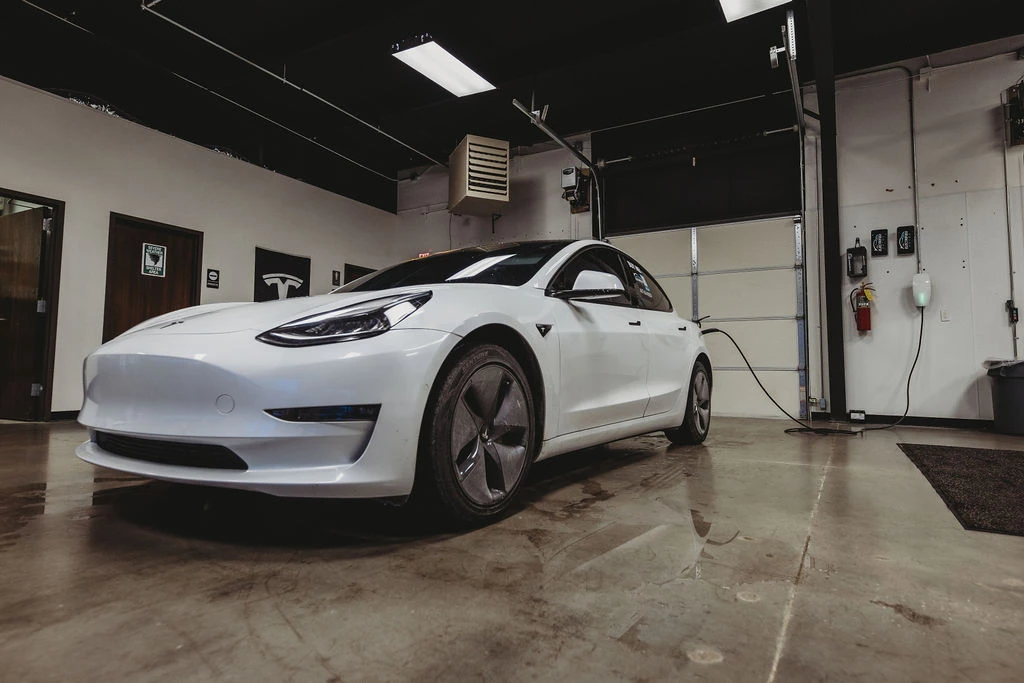 Electric car charging in garage