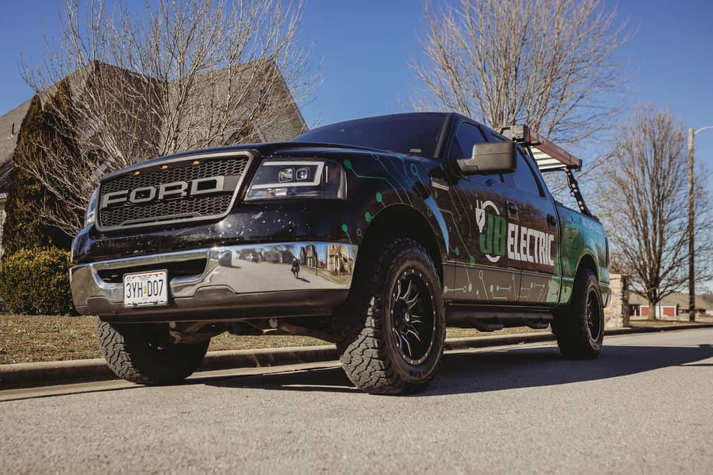 Electric Ford truck parked on suburban street